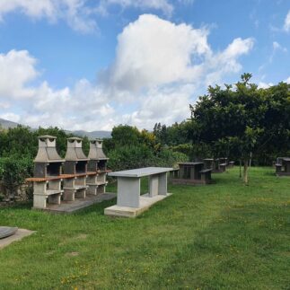 Barbacoa y áreas verdes - Area Suites